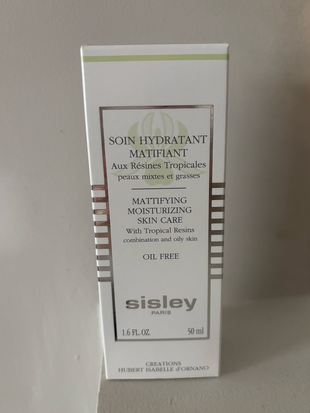 Sisley Mattifying Moisturizer - White with Light Green Accent